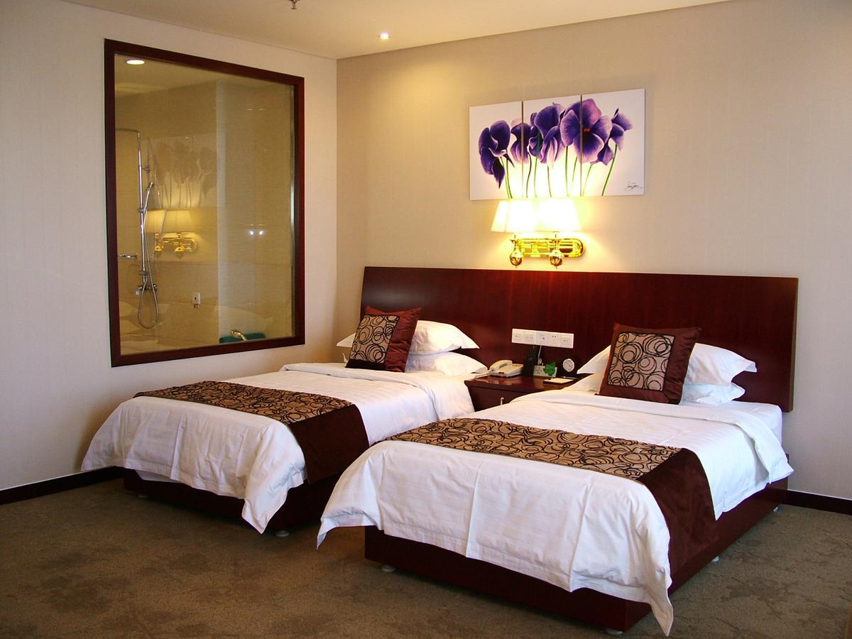 Fuxing Oriental Boutique Hotel Chifeng Bilik gambar